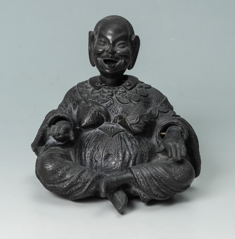 Appraisal: CHINESE CAST BRONZE NODDER Patinated bronze seated nodder with hand