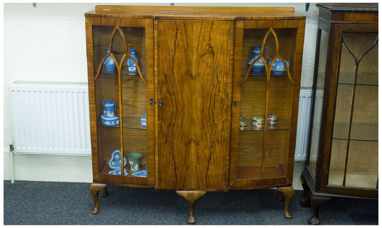 Appraisal: Walnut Display Cabinet Central Panel with Glazed Doors Either Side