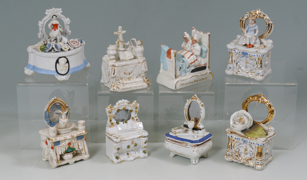 Appraisal: GROUP OF FAIRING SOUVENIR BOXES Depicting well decorated dressers an