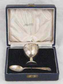 Appraisal: A boxed silver egg cup and spoon by Mappin and