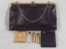 Appraisal: Cartier a fitted vanity bag with silver gilt frame fitted