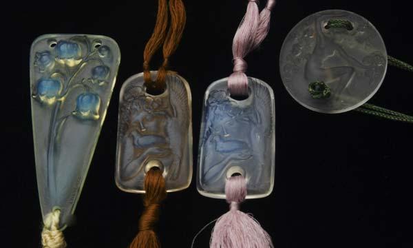 Appraisal: RENE LALIQUE Four pendants Muguet of opalescent glass Chose Promise