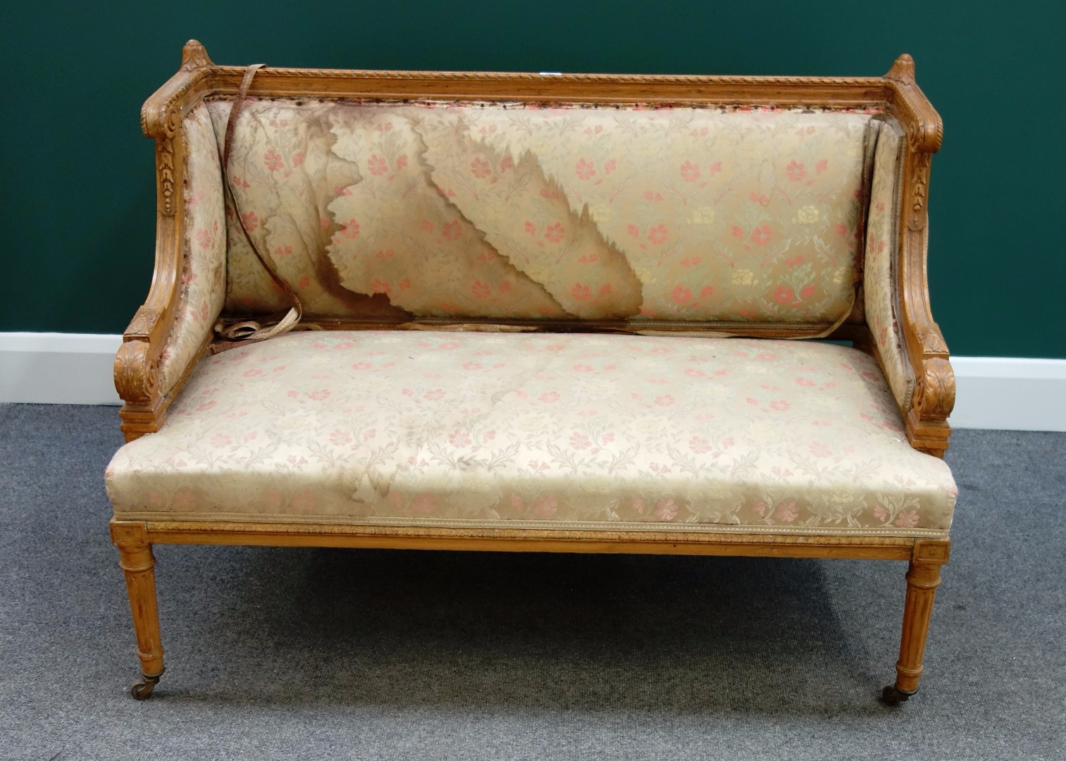 Appraisal: A th century French oak small square back sofa with