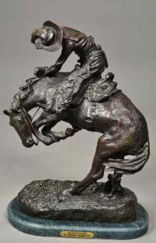 Appraisal: BRONZE SCULPTURE BY FREDERICK REMINGTON''RATTLESNAKE'' depicting cowboy and his horse