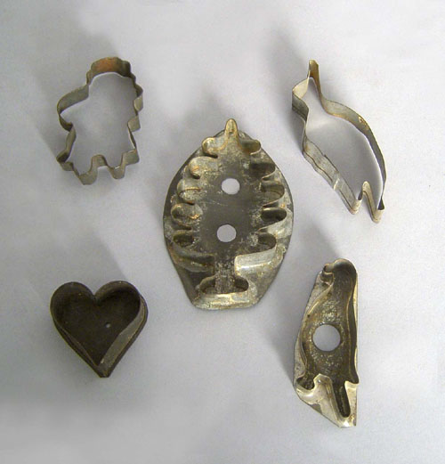 Appraisal: Five tin cookie cutters together with a group of Stiegel