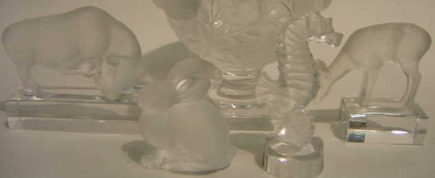 Appraisal: LALIQUE FRANCE Four frosted and clear glass table ornaments seahorse