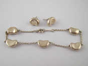 Appraisal: Tiffany Co A silver bracelet with matching earrings designed by