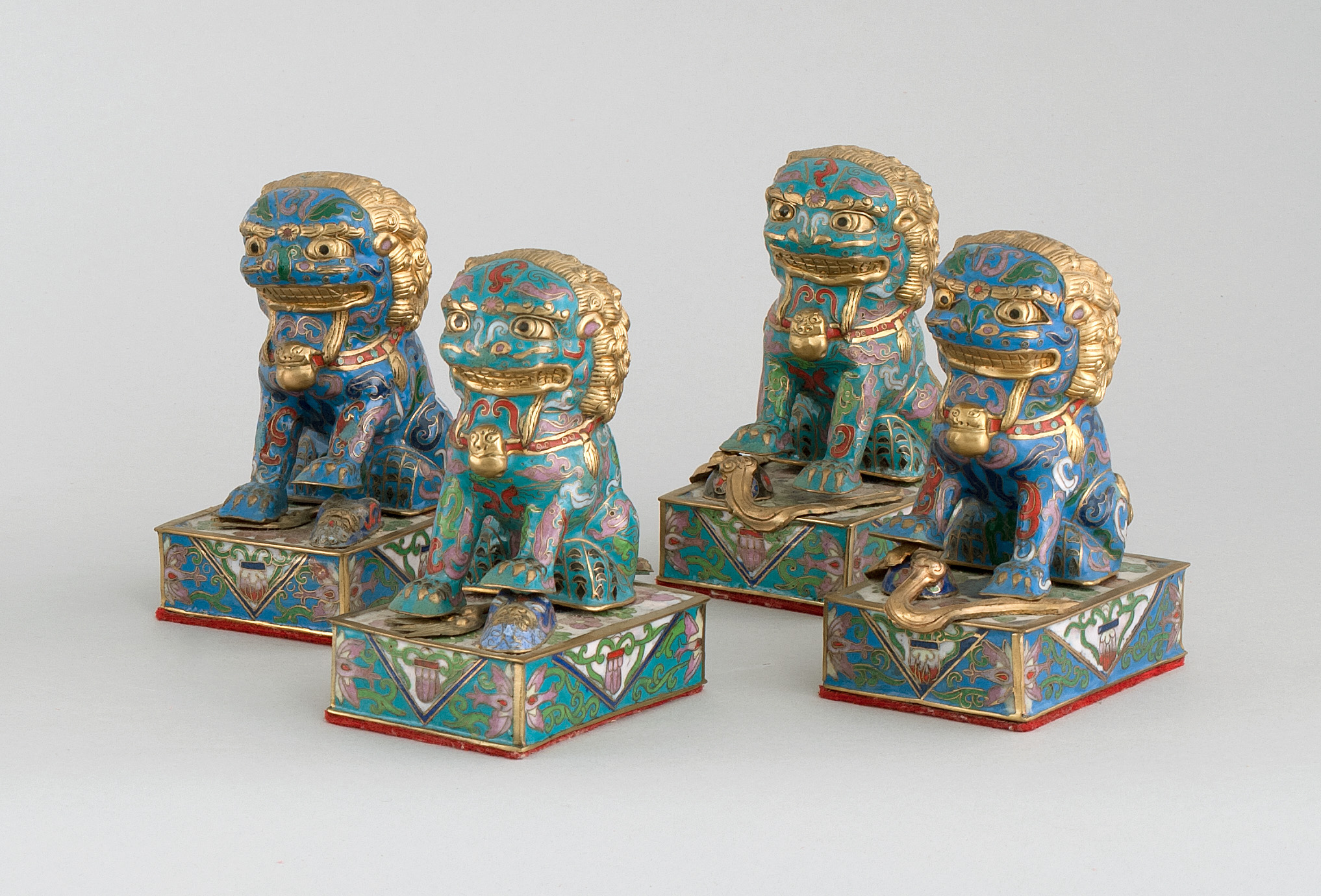 Appraisal: TWO PAIRS OF CLOISONN ENAMEL LION FIGURES th CenturyOne pair