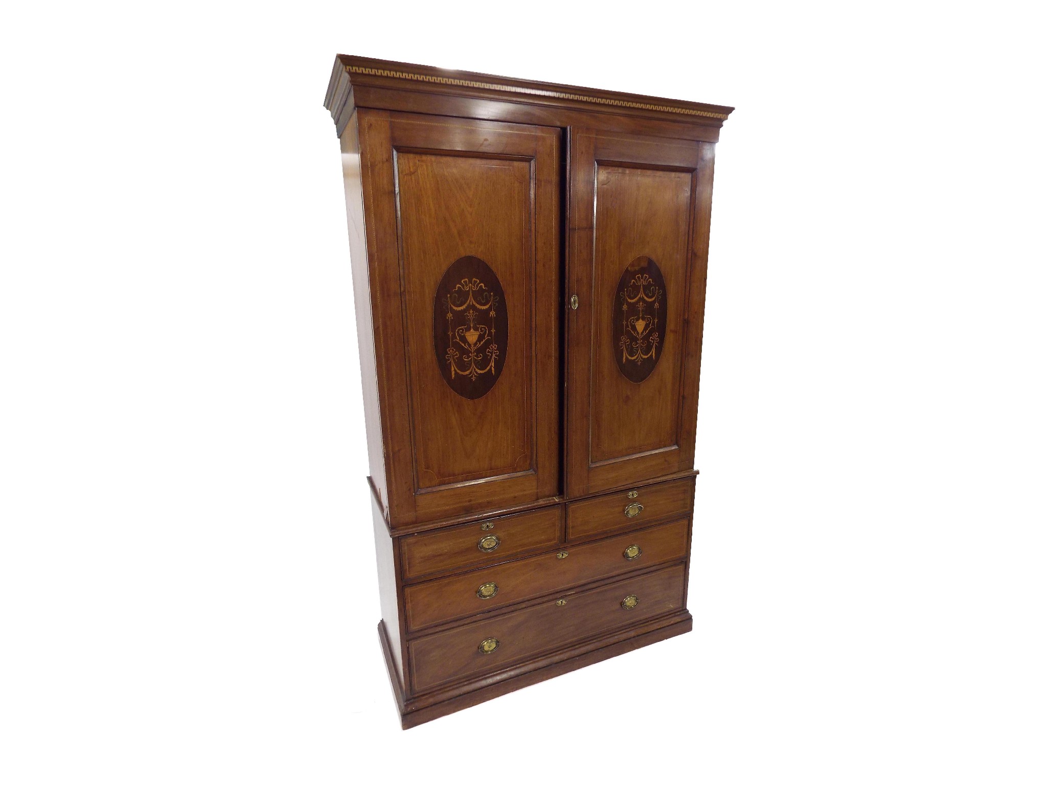 Appraisal: Edwardian mahogany linen press in the Sheraton manner the twin