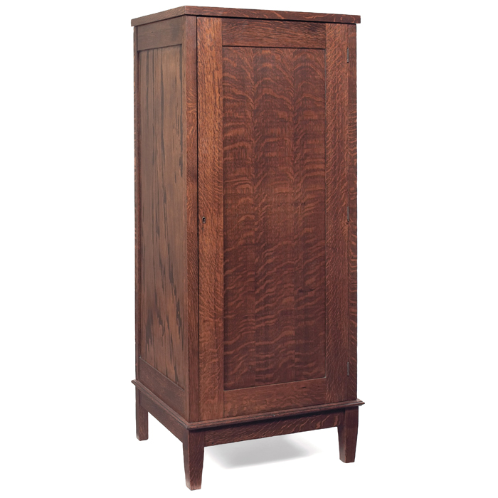 Appraisal: Arts and Crafts wardrobe single paneled door on tapered legs