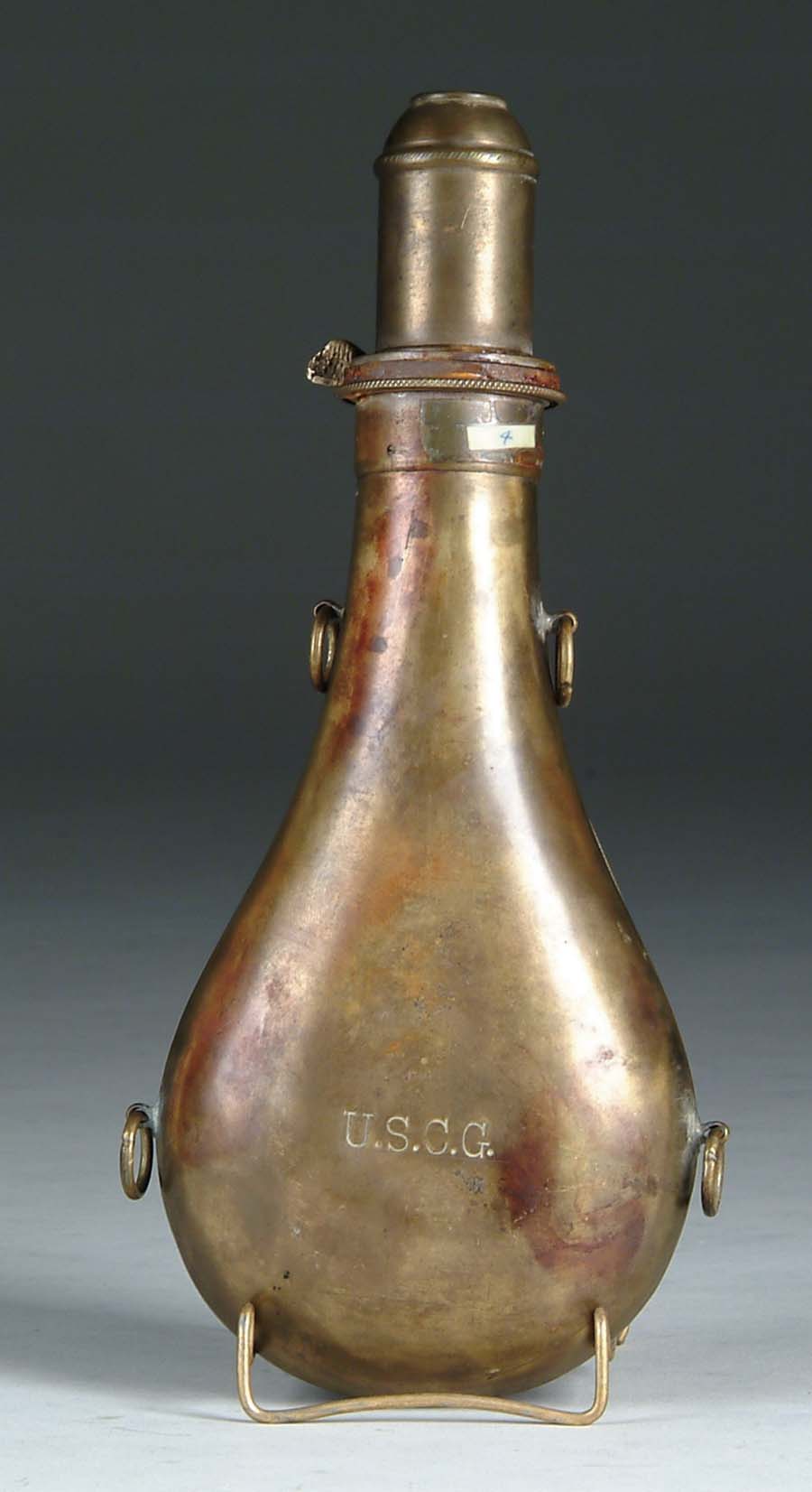 Appraisal: VERY LARGE COAST GUARD MARKED POWDER FLASK All brass flask