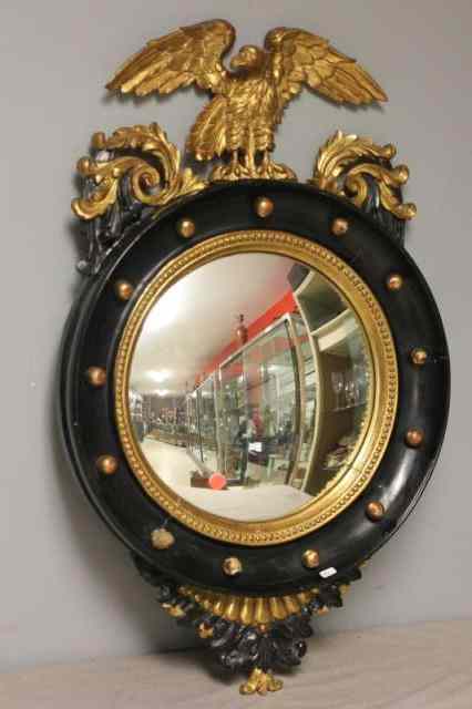 Appraisal: Sheraton Style Convex Mirror with Eagle Crown Gilt and black