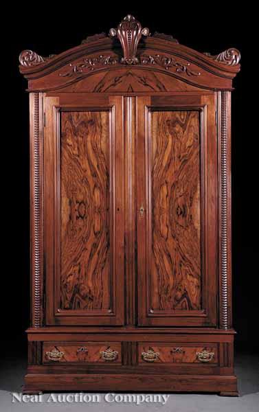 Appraisal: An American Renaissance Carved Walnut and Burl Armoire late th