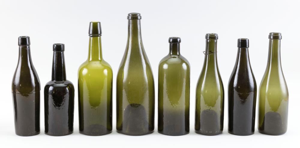 Appraisal: EIGHT EARLY GREEN BLOWN MOLDED GLASS BOTTLES TH CENTURY HEIGHTS