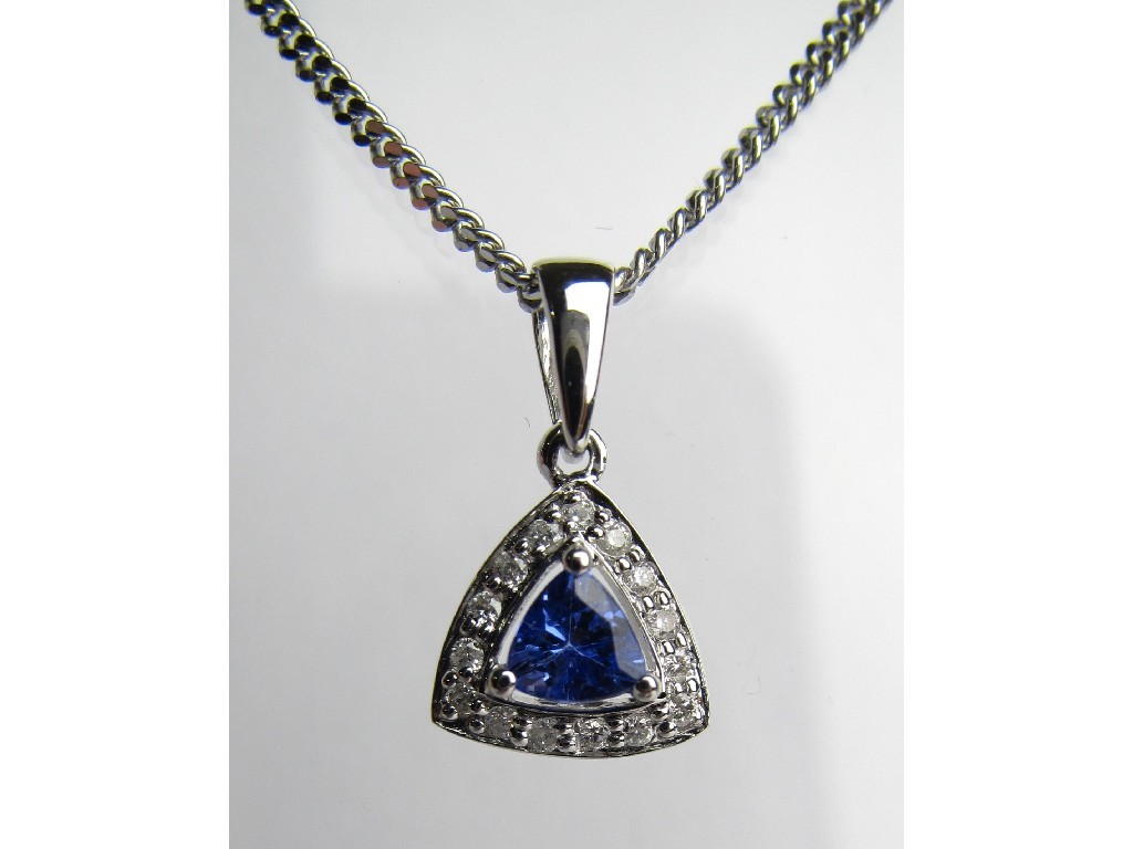 Appraisal: Eighteen carat white gold tanzanite and diamond set pendant on