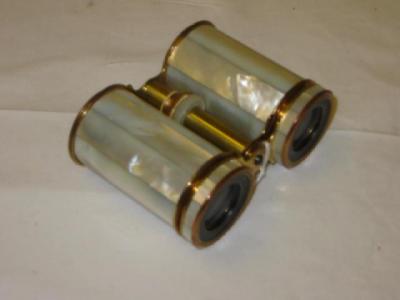 Appraisal: A PAIR OF FRENCH OPERA GLASSES the gilt metal cylindrical