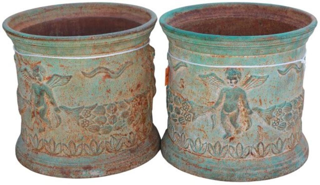 Appraisal: pair Verdigris patinated cast iron garden planters cylindrical form ornamented