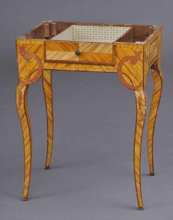 Appraisal: ITALIAN ROCOCO WOOD-GRAINED SIDE TABLE Containing a quarter-veneered drawer and