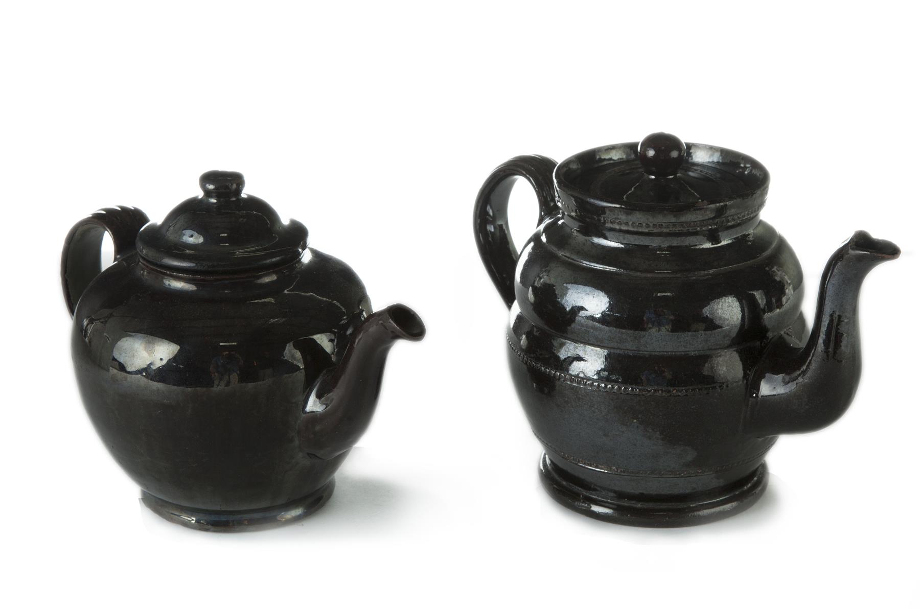 Appraisal: TWO AMERICAN REDWARE TEAPOTS Second quarter- th century Coggled decoration