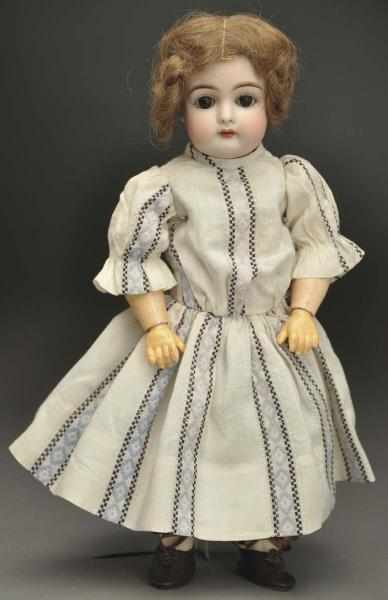 Appraisal: Darling German Bisque Child Doll Socket head with early pale