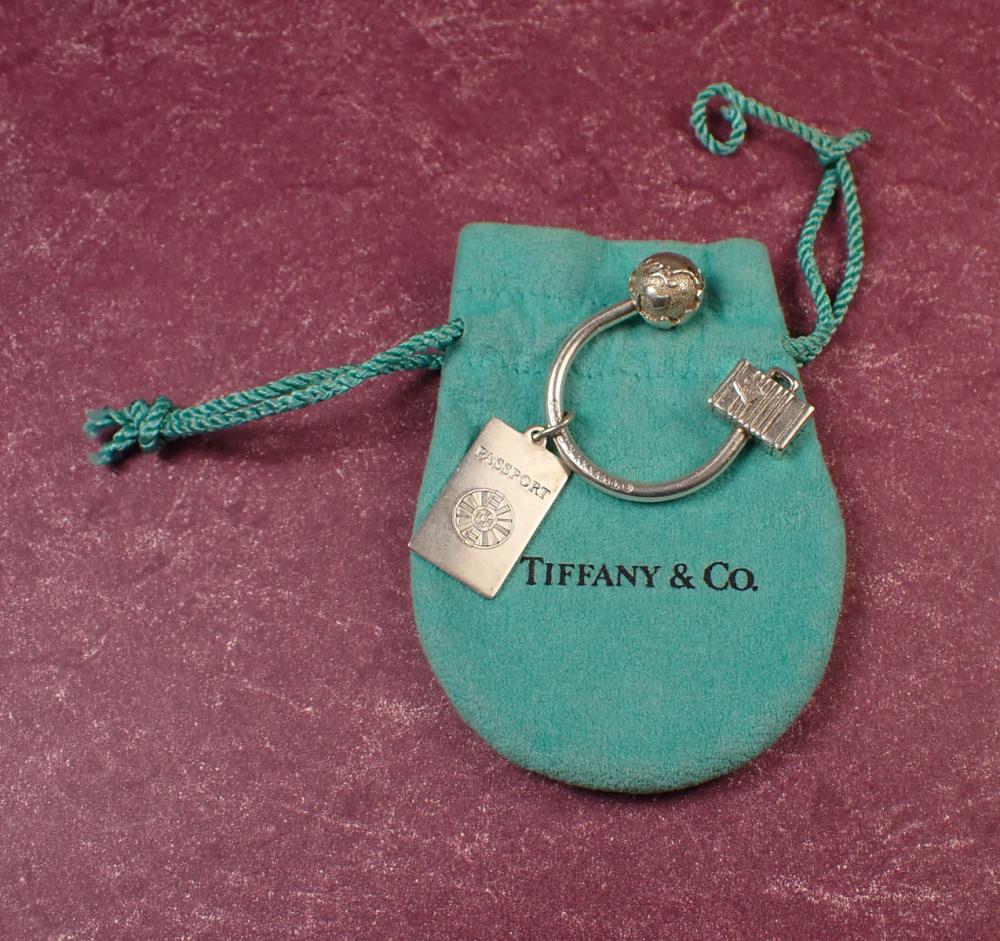 Appraisal: TIFFANY CO STERLING SILVER KEY RING The travel themed key