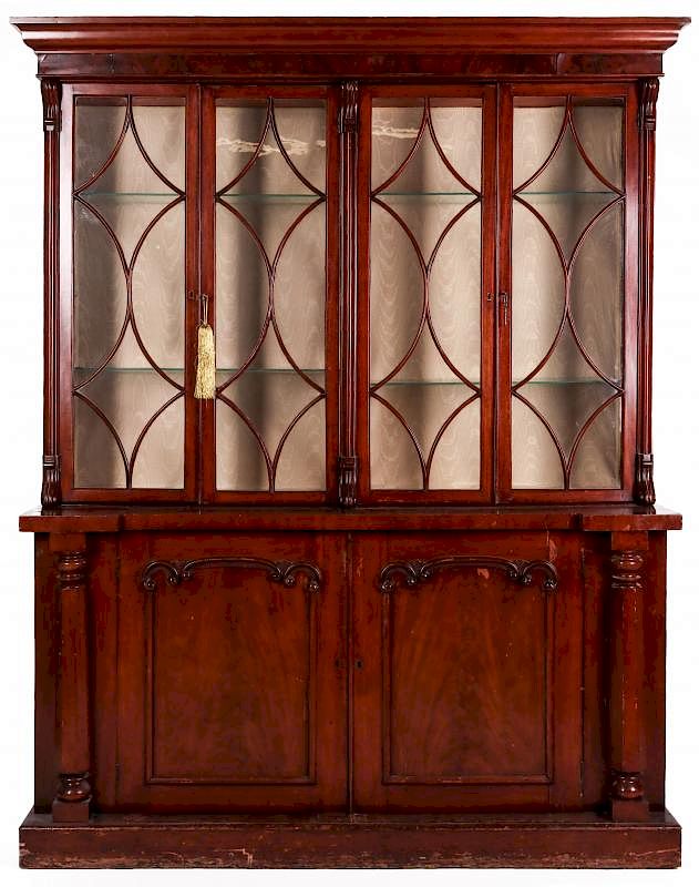 Appraisal: A TH CENTURY CONTINENTAL MAHOGANY BREAKFRONT With molded cornice over