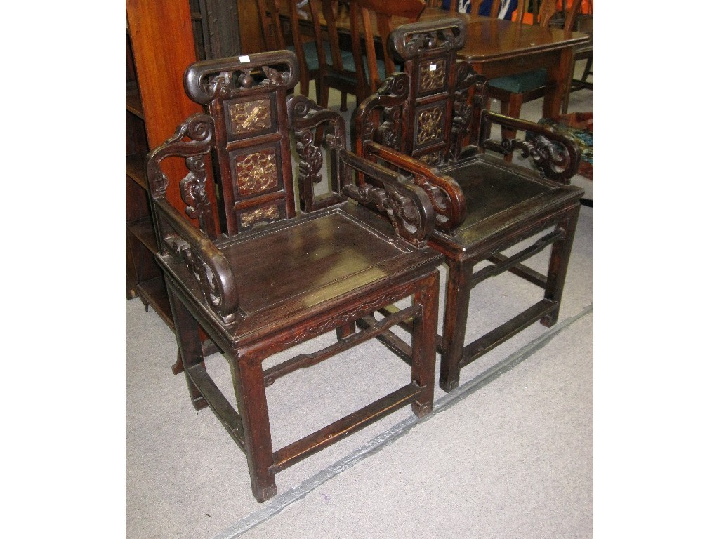 Appraisal: Pair of Chinese carved and gilded rosewood throne chairs