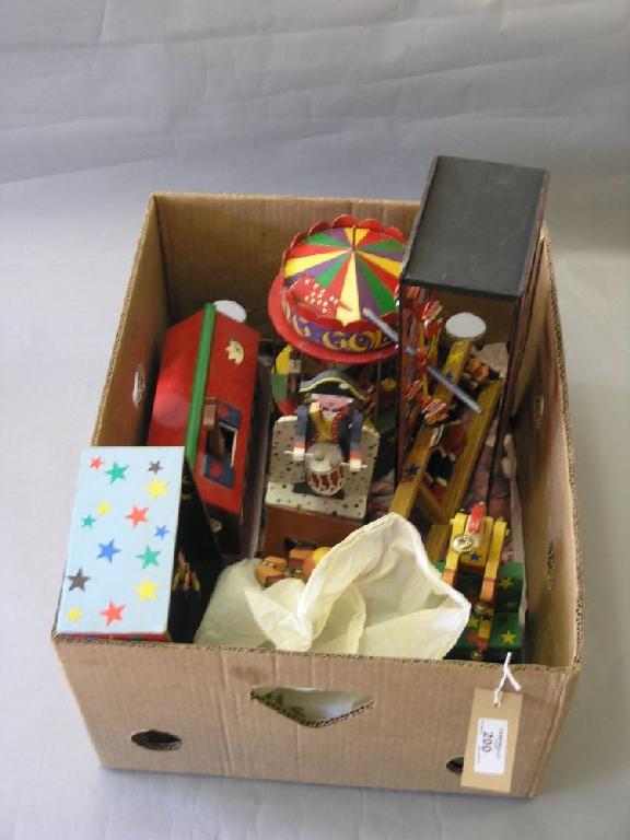 Appraisal: Victorian style painted wood toys to include a sand automaton