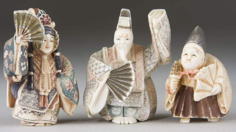 Appraisal: Three Ivory Kabuki Theater Netsukes in traditional costumes each holding