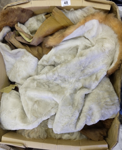 Appraisal: Sheep skin rug fur coats and fox stole