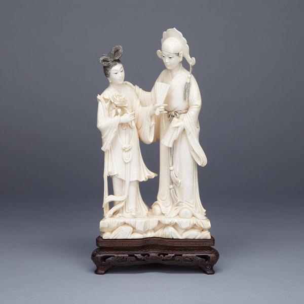 Appraisal: Ivory Carved Scholar and Maiden Group Circa s Standing on