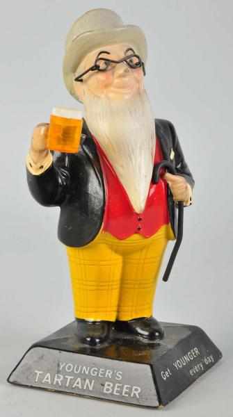 Appraisal: Younger's Tartan Beer Advertising Figure s Rubberoid Condition Excellent Size