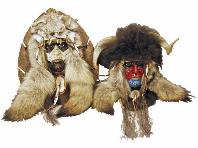 Appraisal: Well accomplished pair of Native American masks incorporating buffalo hide