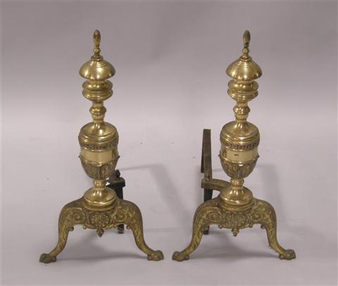 Appraisal: PAIR OF BRASS ANDIRONS With central foliate cast urn form