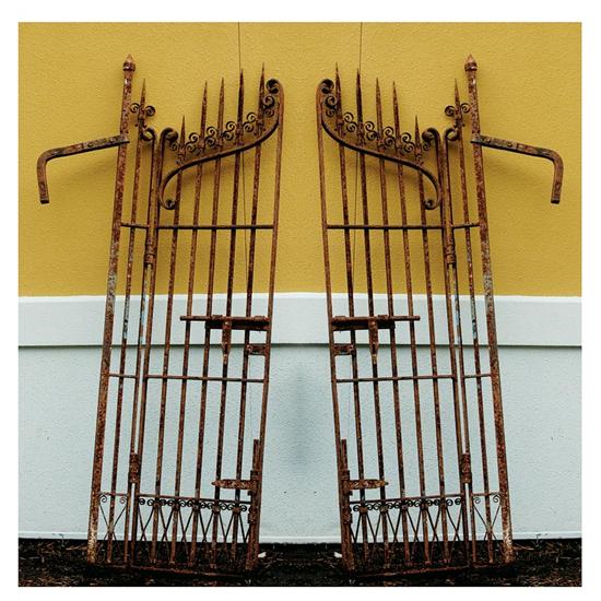 Appraisal: Set wrought-iron gates th century hinged panels with spearhead spindles