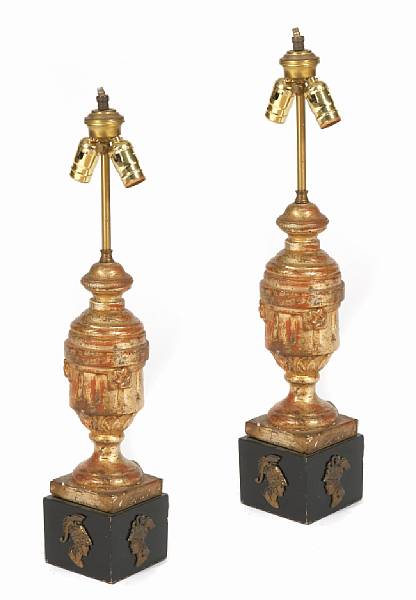 Appraisal: A pair of Italian Baroque style carved giltwood table lamps