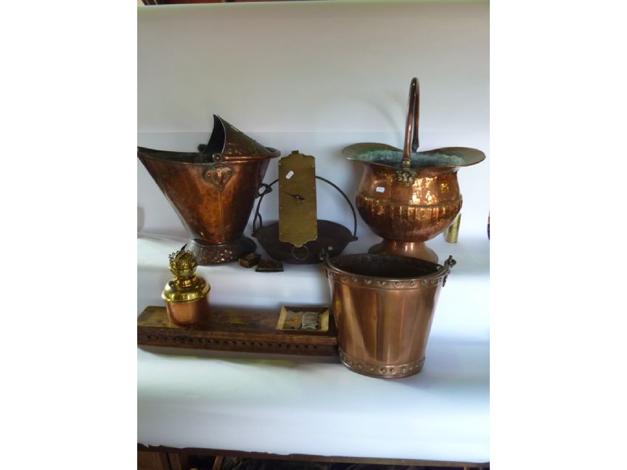 Appraisal: A good quality th century copper coal scuttle with applied