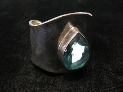 Appraisal: Sterling and blue crystal cuff Small sterling silver cuff with