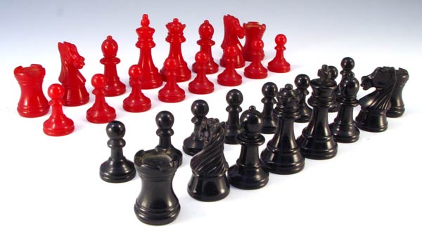 Appraisal: BAKELITE CHESS SET black and red pieces the kings are