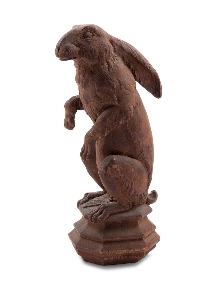 Appraisal: A Continental Carved Pine Figure of a Rabbit A Continental