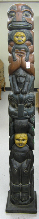 Appraisal: CARVED AND PAINTED WOOD TOTEM POLE featuring four carved totem