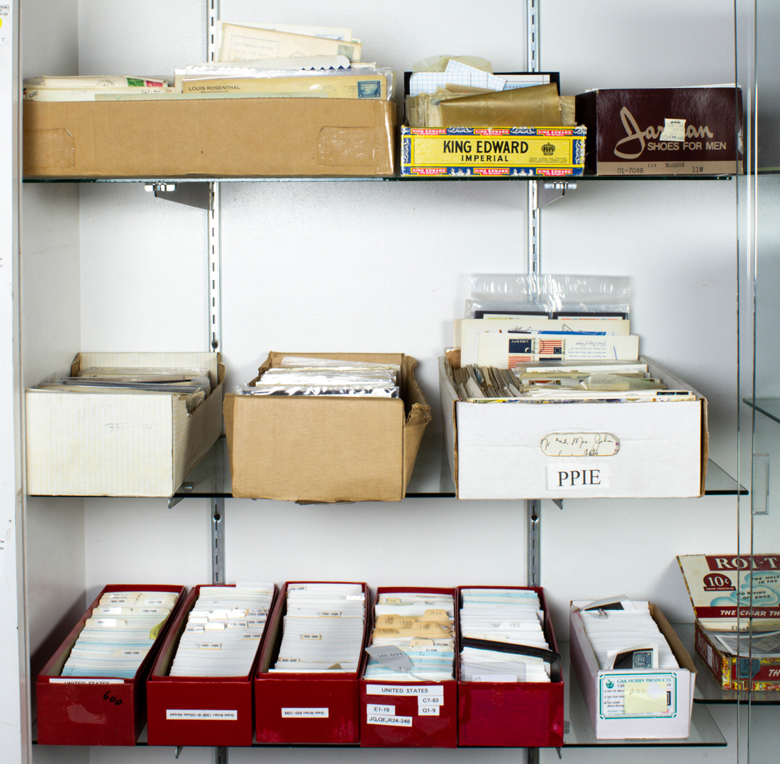 Appraisal: THREE SHELVES OF ASSOCIATED BOXES OF STAMPS Three shelves of