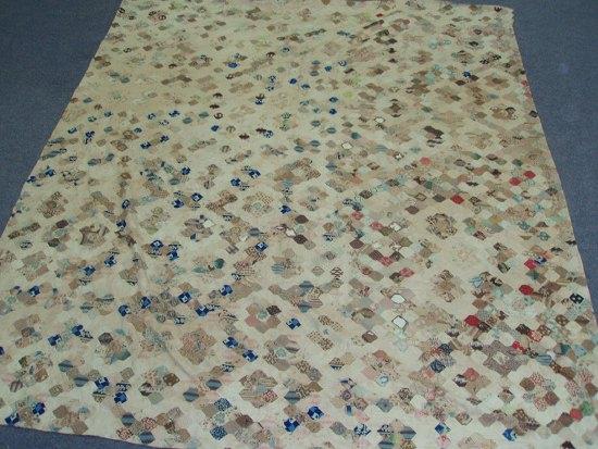 Appraisal: A late th Century patchwork quilt cm x cm x