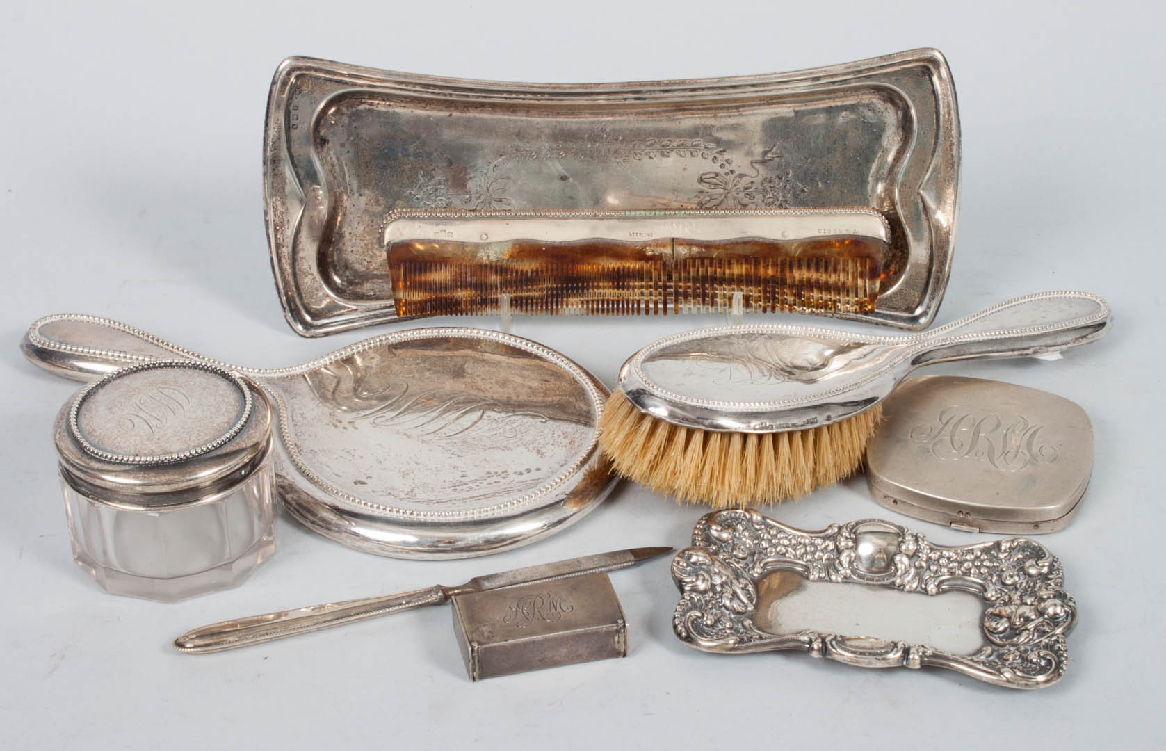 Appraisal: Nine sterling silver personal dresser items including dresser tray pin