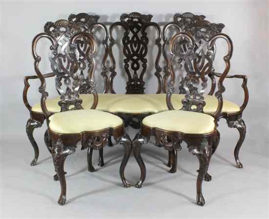 Appraisal: An th century design carved walnut three piece salon suite