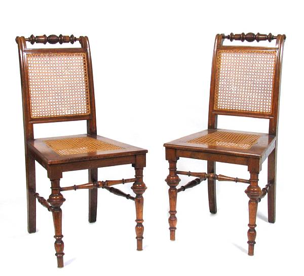 Appraisal: A set of four French fruitwood dining chairs with caned