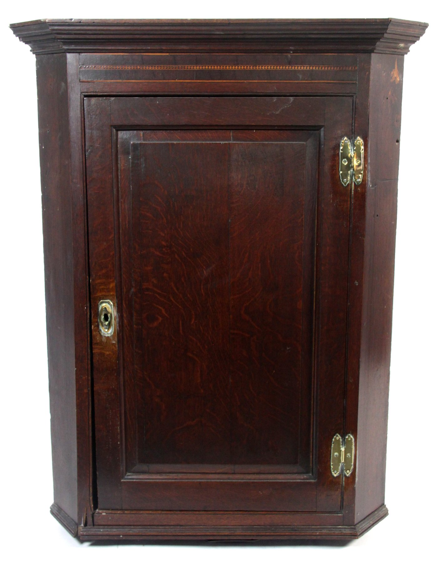 Appraisal: An early th Century oak corner cupboard fitted adjustable shelves