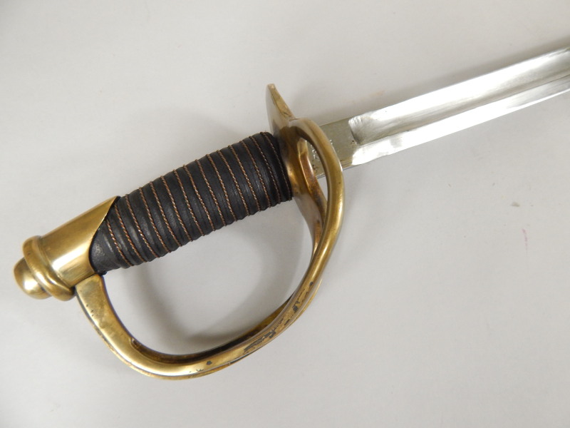 Appraisal: A reproduction of a late thC Light Cavalry sabre stamped