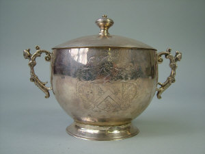 Appraisal: A silver twin handled cup and cover on pedestal base