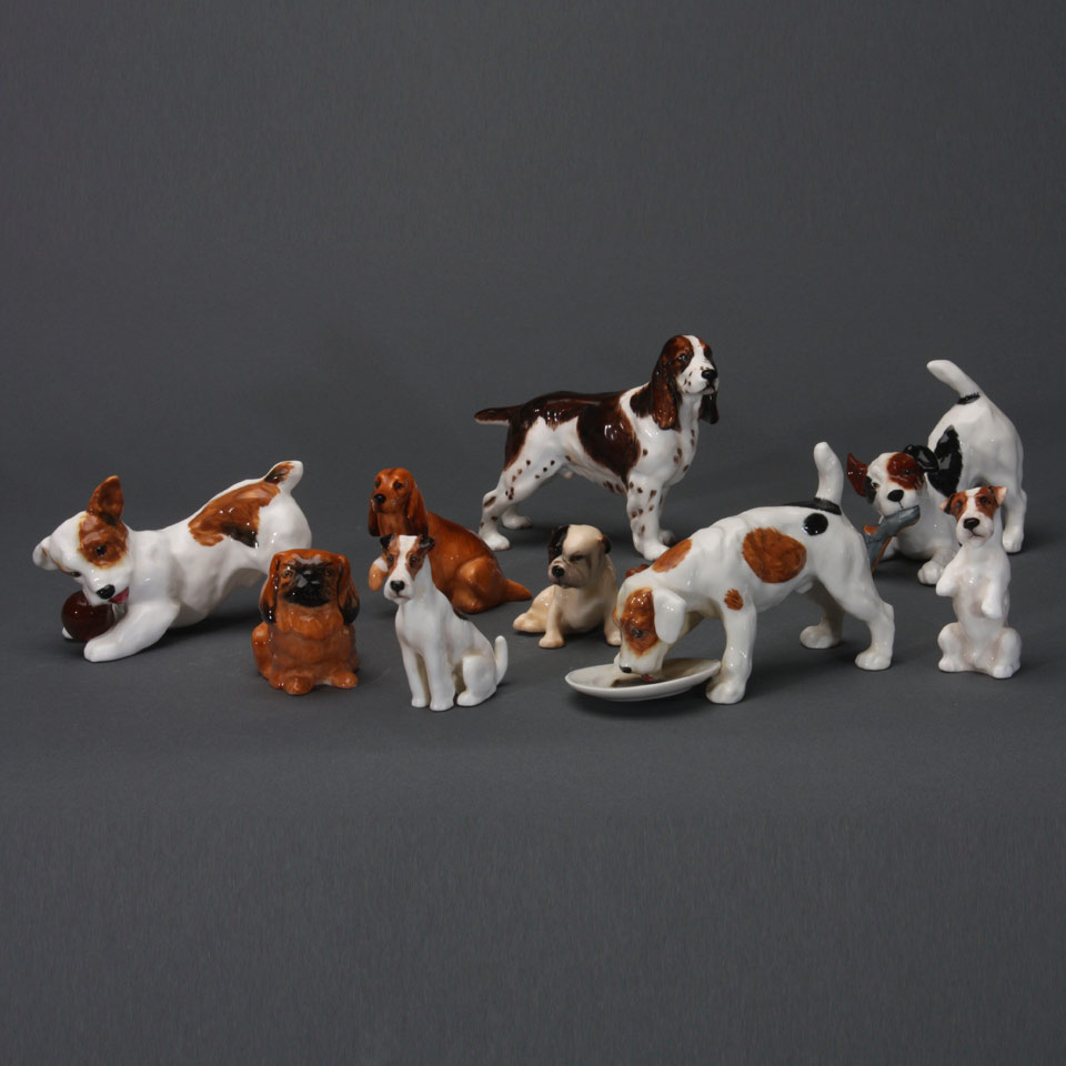 Appraisal: Nine Royal Doulton Dog Figurines Baby Bulldog K Cocker Spaniel